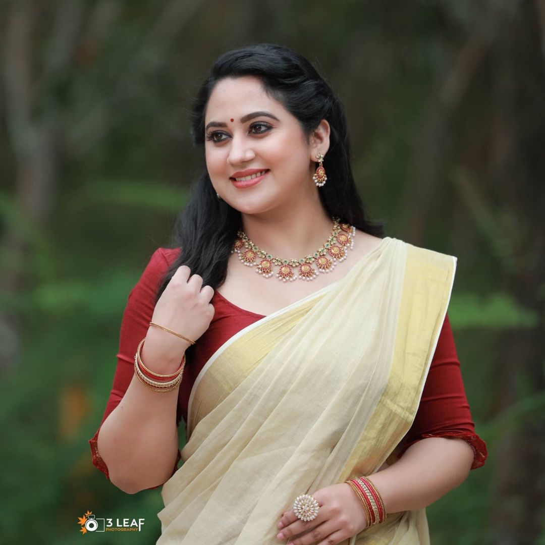 malayalam actress miya george stills in yellow saree red blouse